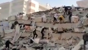 İzmir'de şiddetli deprem! Bir bina yıkıldı