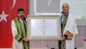 İKÇÜ rektöründen 'Gençleri Evlendirme Vakfı' başkanına Fahri Doktora!