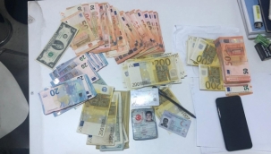 İzmir'de sahte dövizle cep telefonu almaya çalışan 6 kişi yakalandı 
