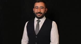 İzmir siyasetinin tanınmış isimlerindendi: FETÖ'nün fiber teknesinde yakalandı