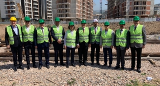 Baretleri taktılar şantiyeye indiler: Batı Koop'tan eleştirilere yanıt 