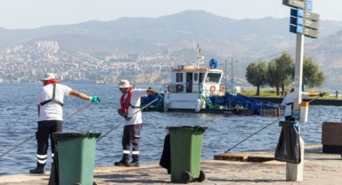 Deniz süpürgeleri ve yüzen bariyerler temiz Körfez için iş başında