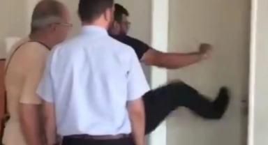 Kapı kıran ve 'başı açık öğrenciye karışırız' diyen müdüre MEB'ten skandal karar