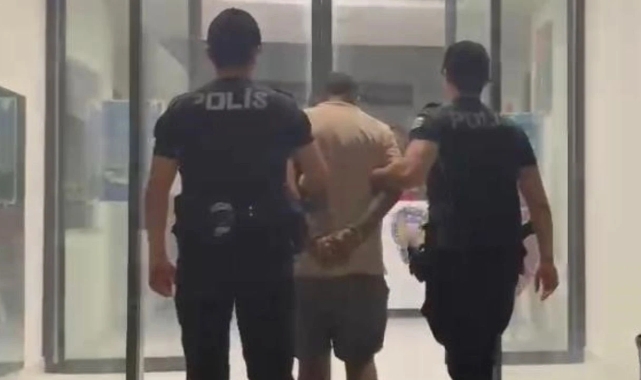 'Zorla ırza geçme' suçundan aranıyordu: İzmir'de yakalandı!